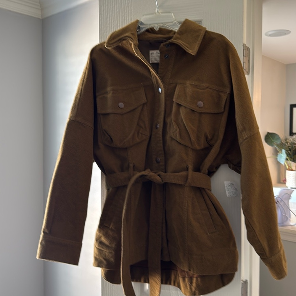 We the free jacket , brown , size M 
Longer in back detail , ties at waist .